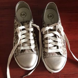 size 7.5 golden color MK sneakers